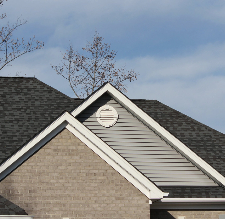 house with shingle roof before inspection
